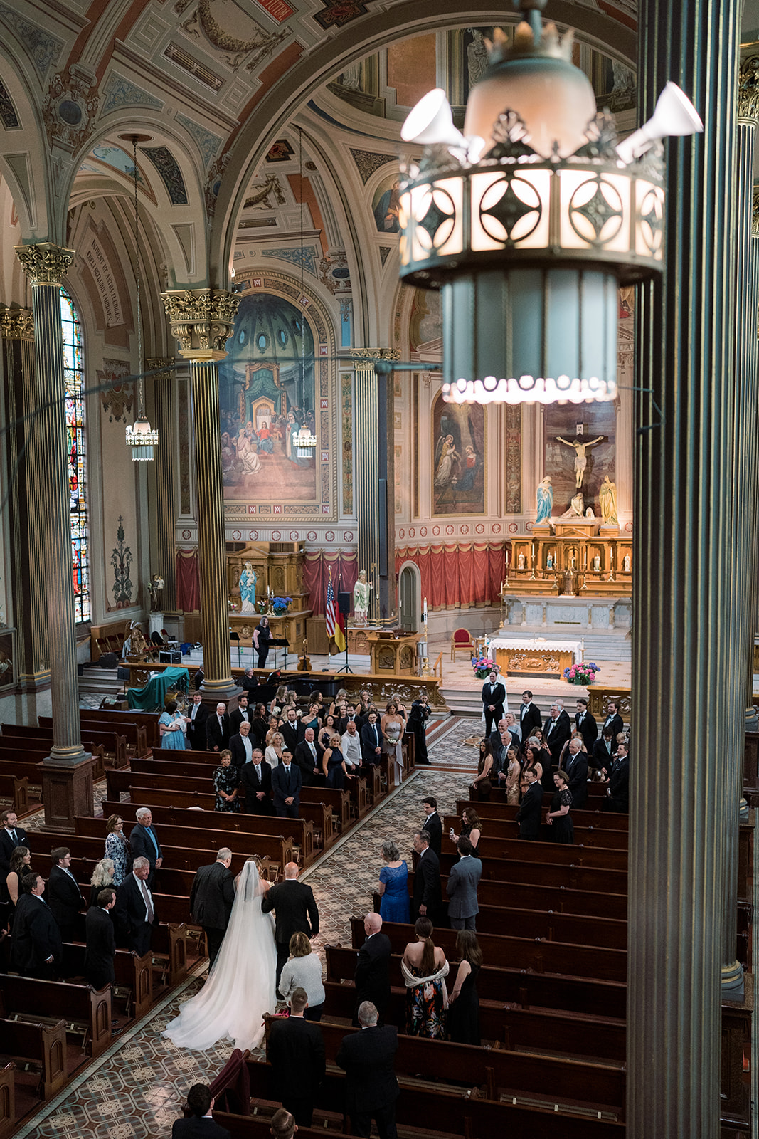 High-angle view of the wedding processional inside Mother of God Church