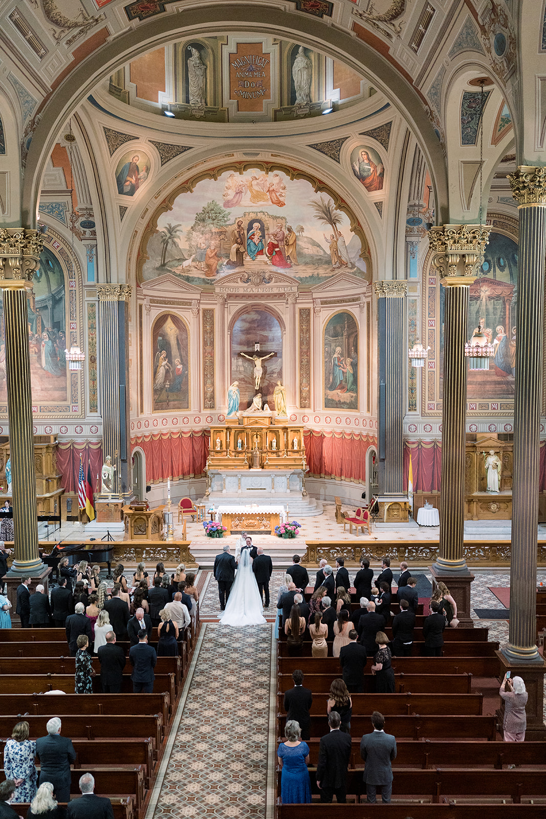 Wide view of Ben and Hannalee at the altar inside Mother of God Church