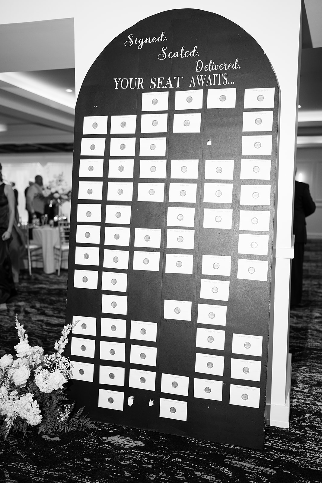 Signed, Sealed, Delivered reception seating chart for wedding guests