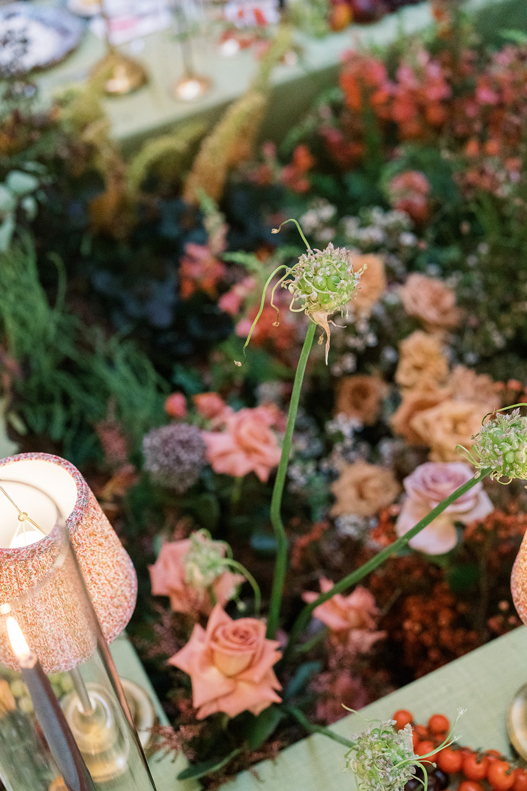 Close detail of flowers and table styling at Jeff and Breanna's reception