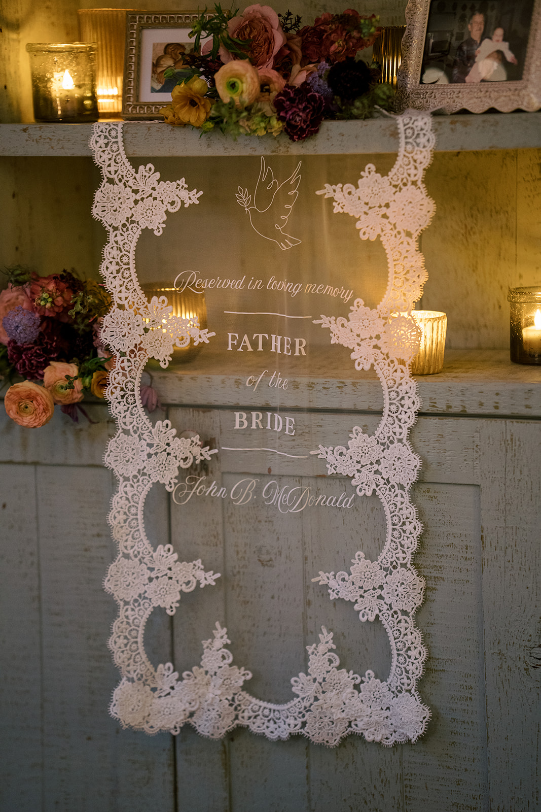 Decorative wedding seating display surrounded by flowers