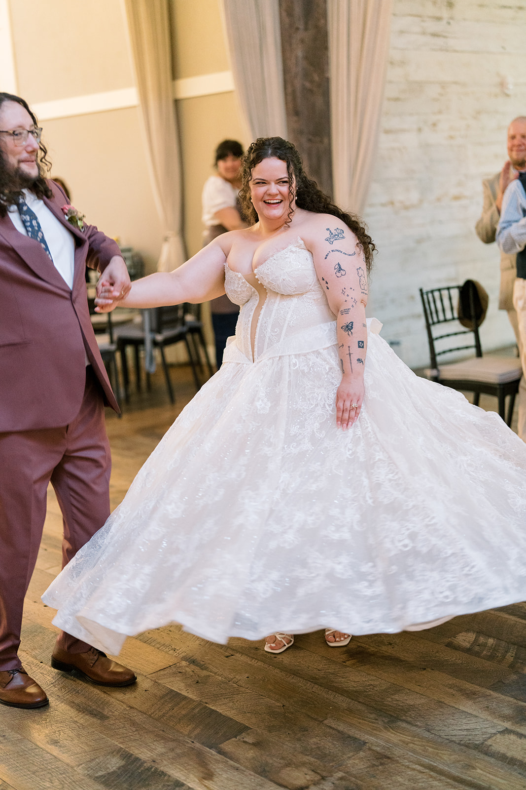 Bride moving across the reception floor during the celebration