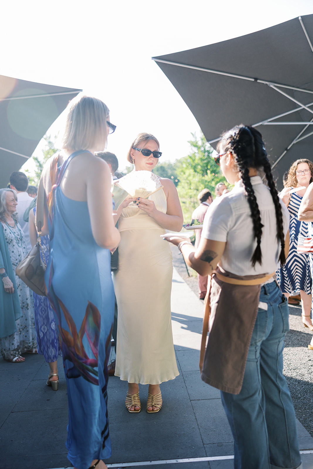 Guests gathered outdoors during cocktail hour
