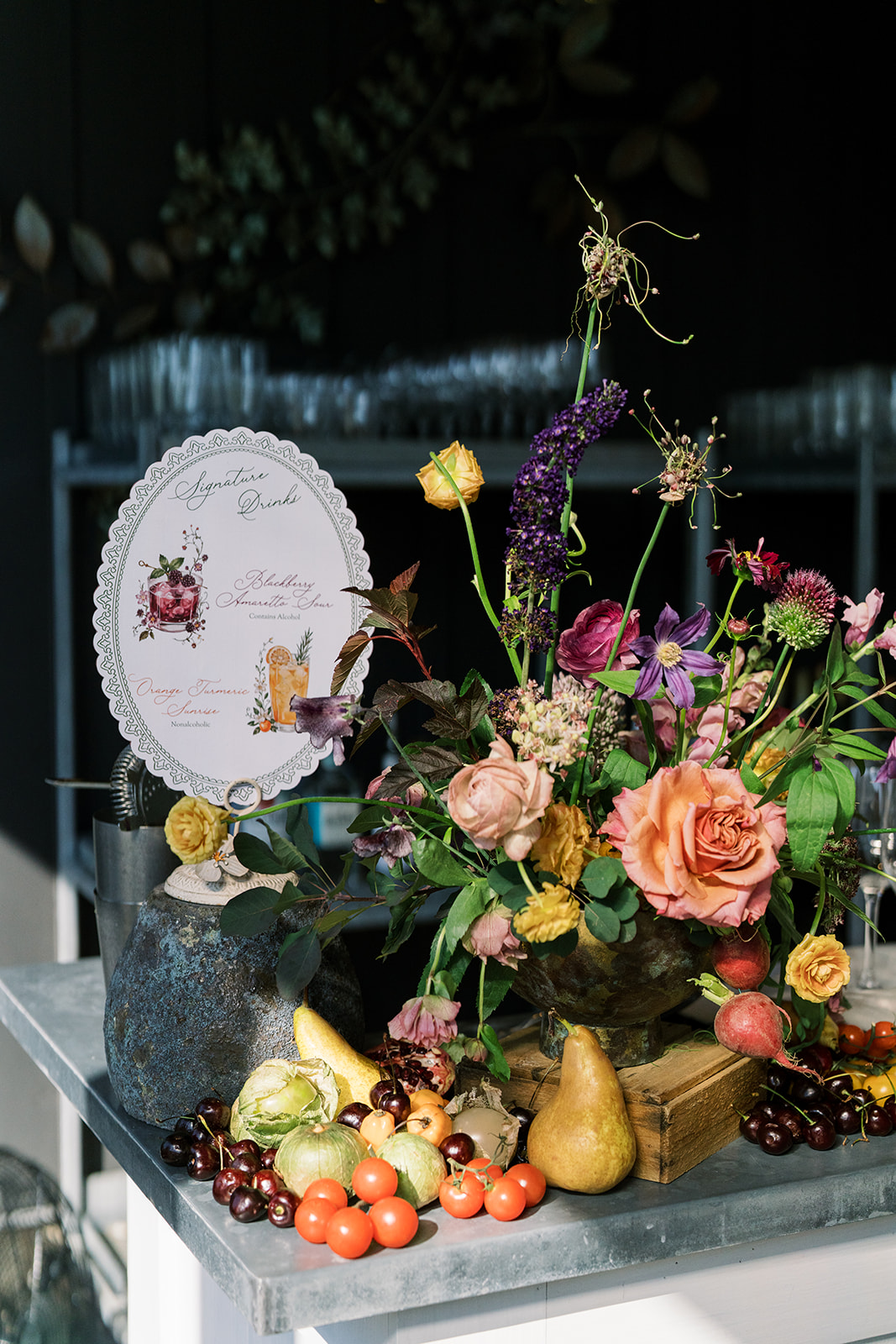 Fruit and floral styling at the wedding bar or reception display