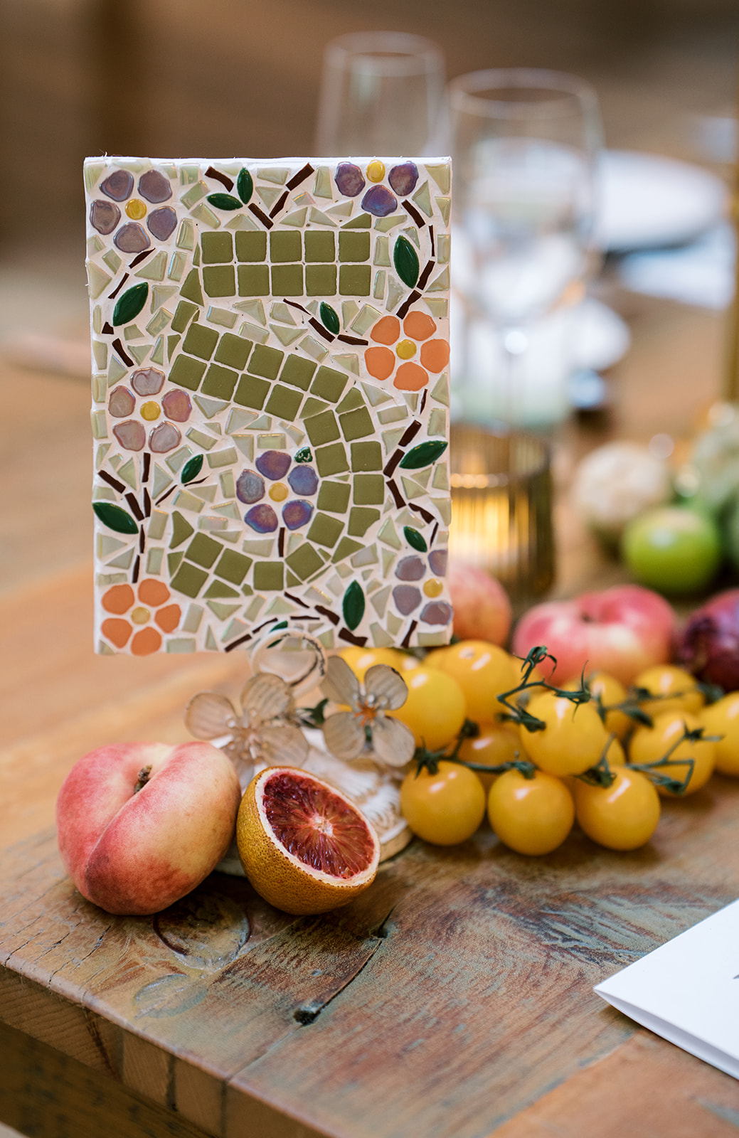 Table number two displayed with citrus and floral accents