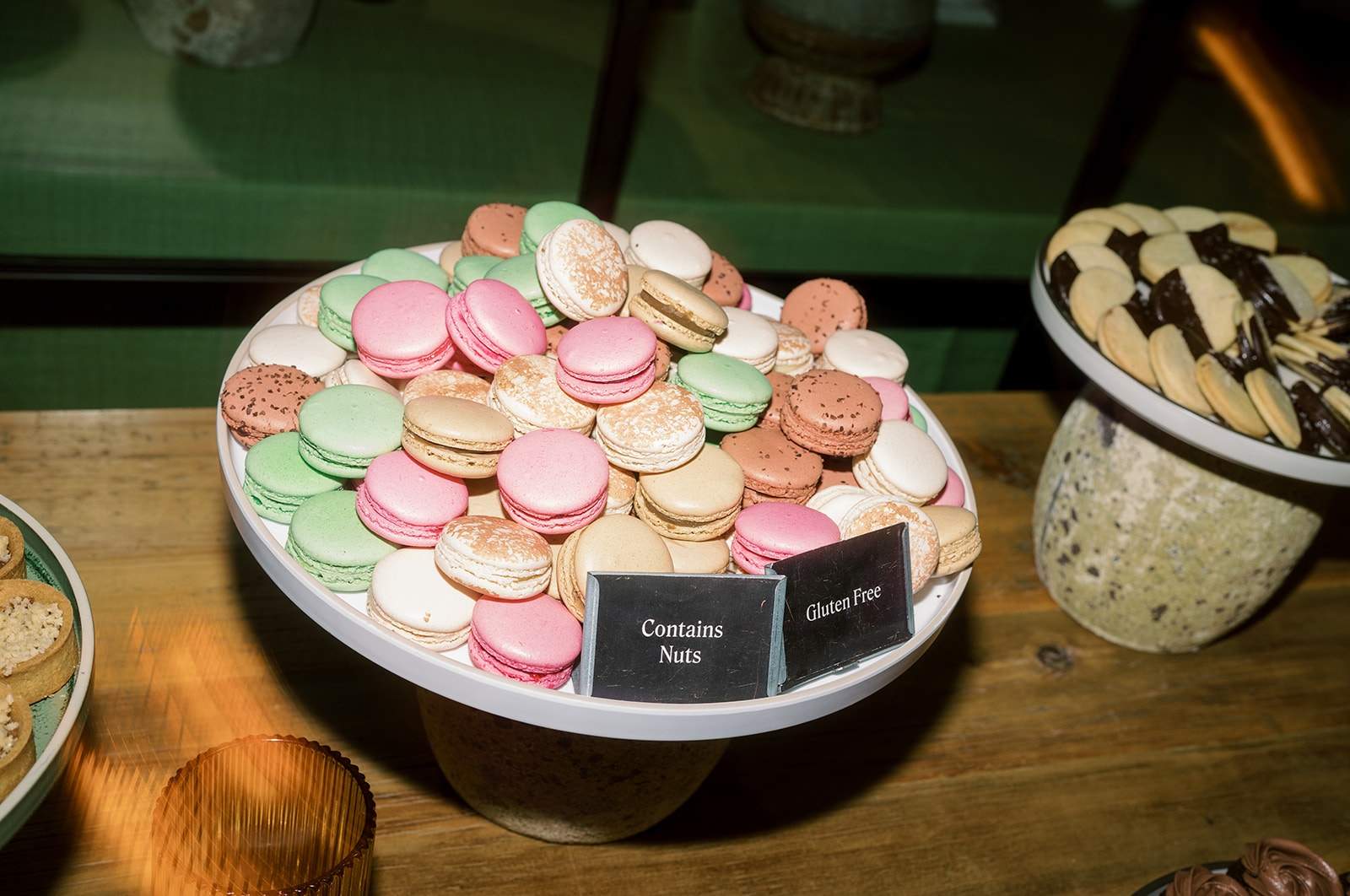 Pink and green macarons arranged for the wedding dessert display