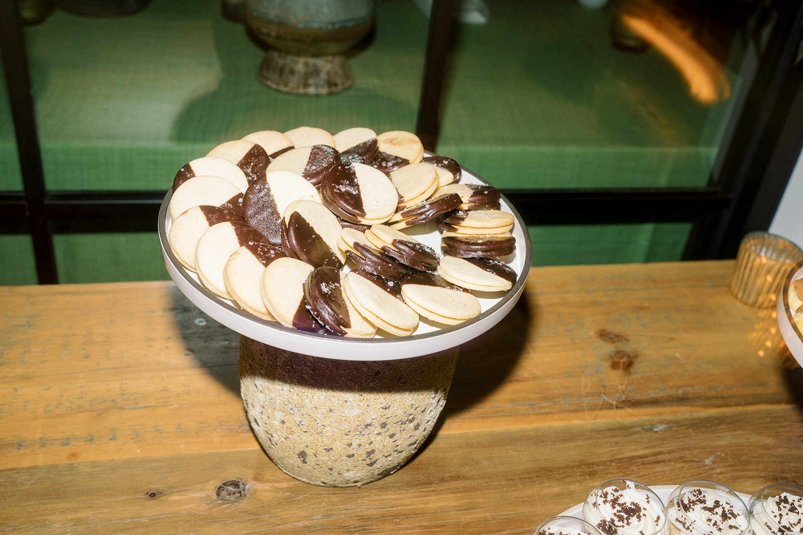 Chocolate-dipped cookies on the wedding dessert display
