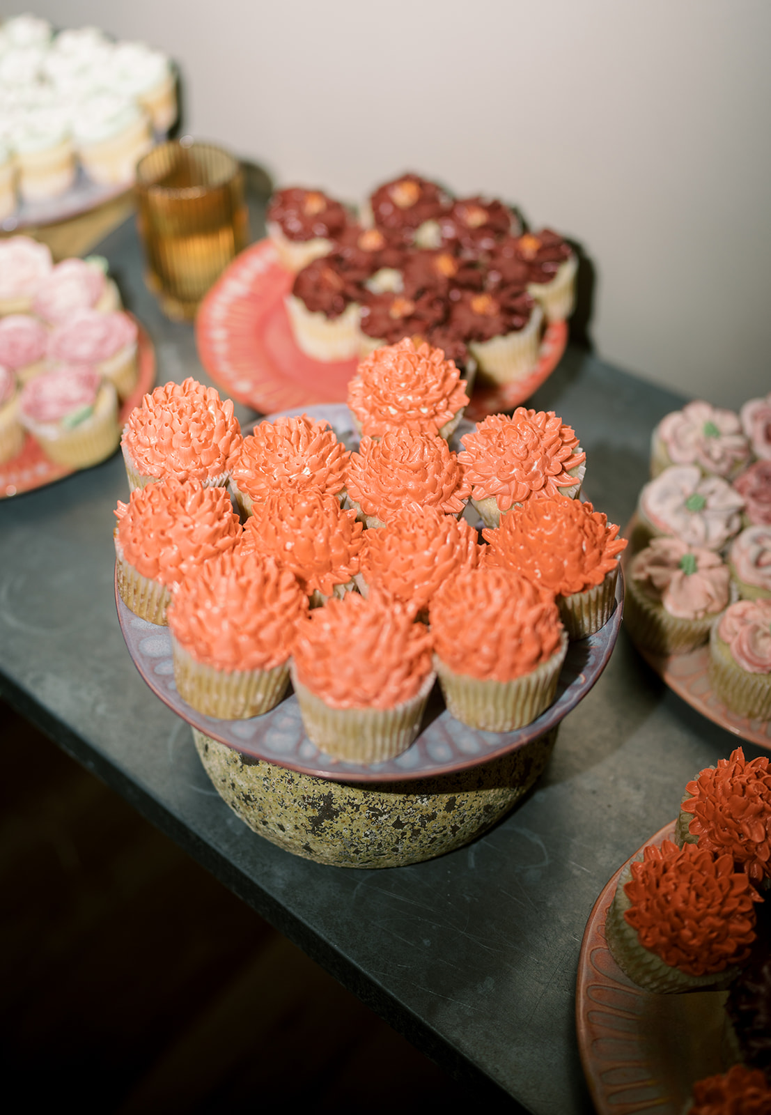 Colorful cupcakes displayed in small groups