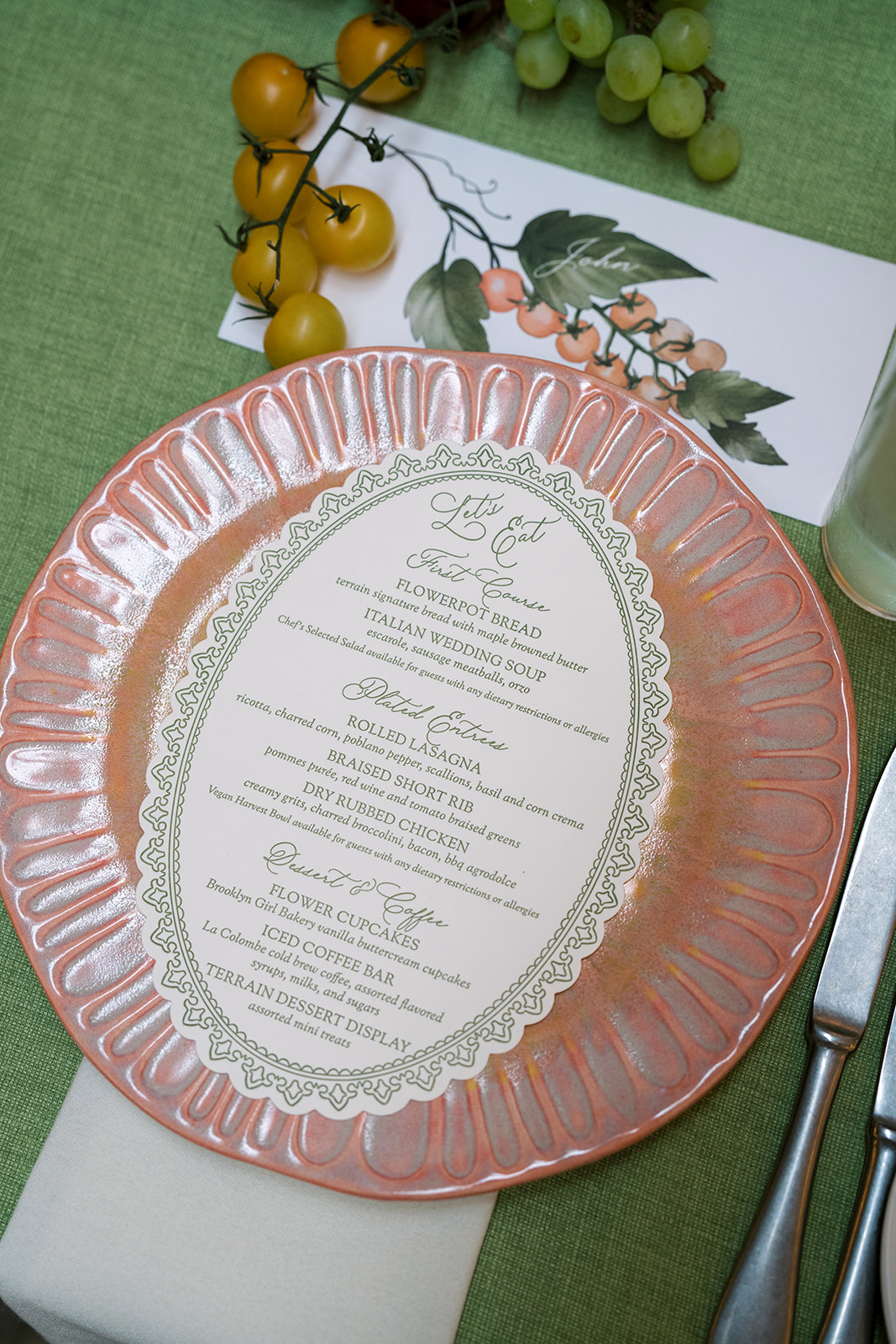 Dinner menu on an iridescent plate over a green linen