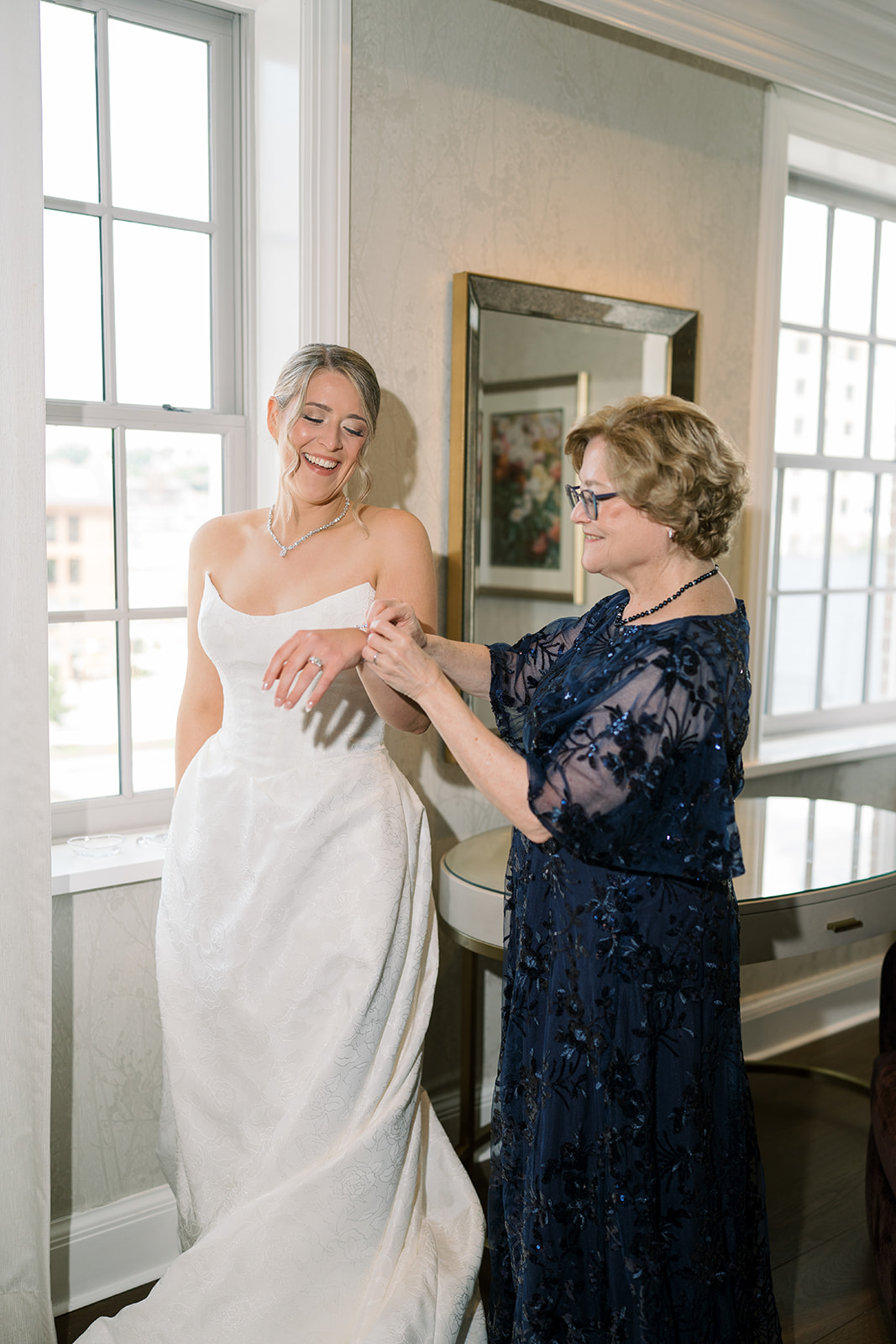 Caroline with her mother while getting dressed for the wedding