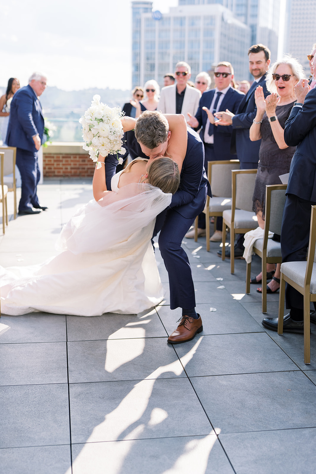 Caroline celebrating during the rooftop ceremony at Vista at Lytle Park