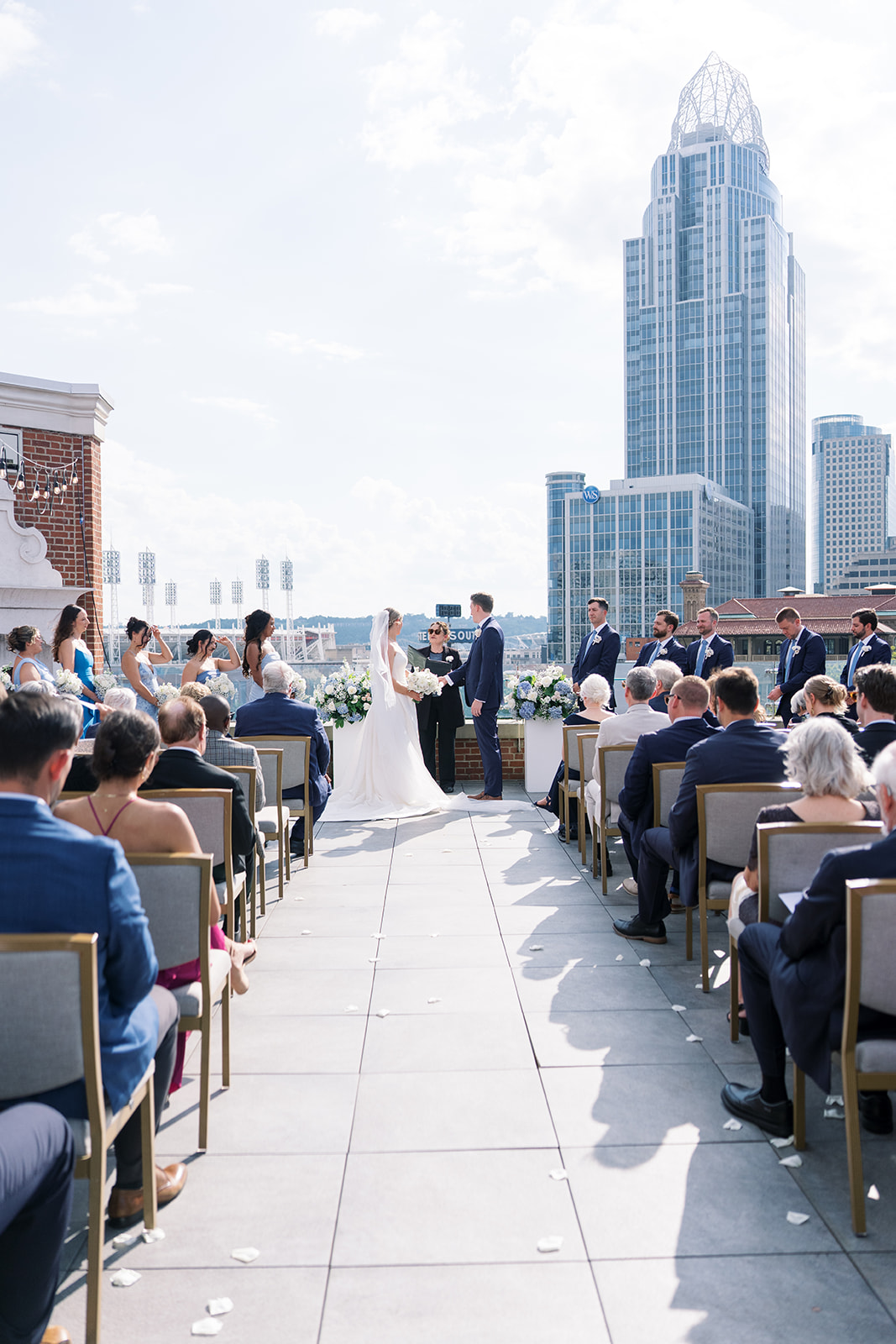 Joey and Caroline during their rooftop wedding ceremony at Vista at Lytle Park