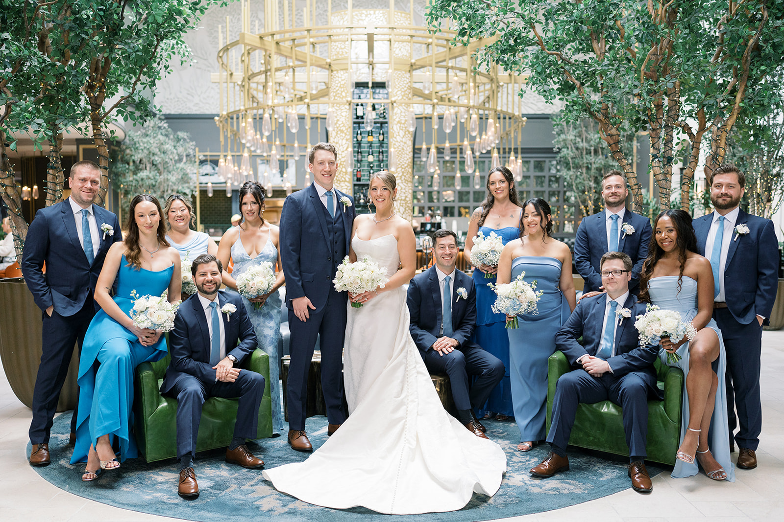 Joey and Caroline with their wedding party inside The Lytle Park Hotel