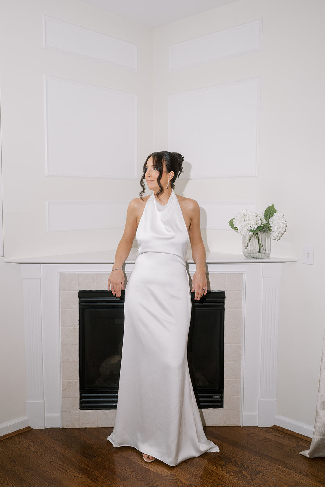 Meghan in her white halter wedding gown during getting ready in Cincinnati