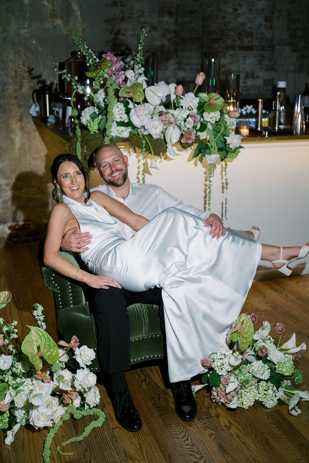 Meghan and Kevin sharing a playful moment during the reception