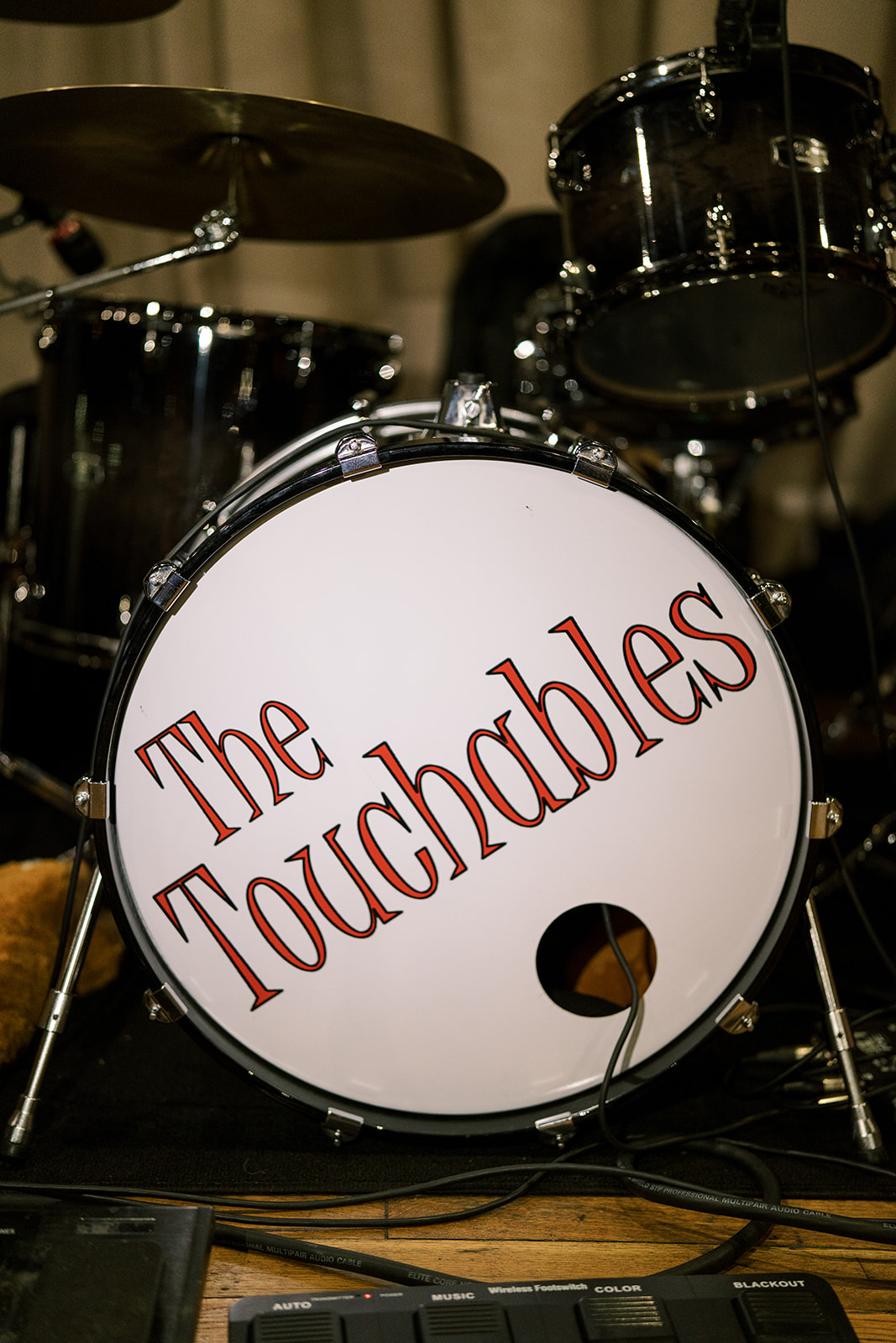 The Touchables band name displayed on the drum kit at Meghan and Kevin's reception