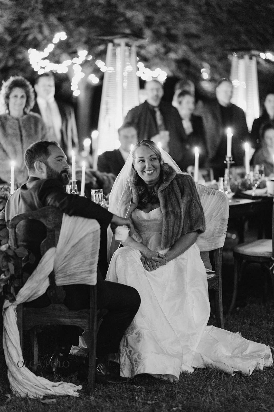 Candid portrait of Beth during the outdoor wedding dinner at Heartland of Versailles