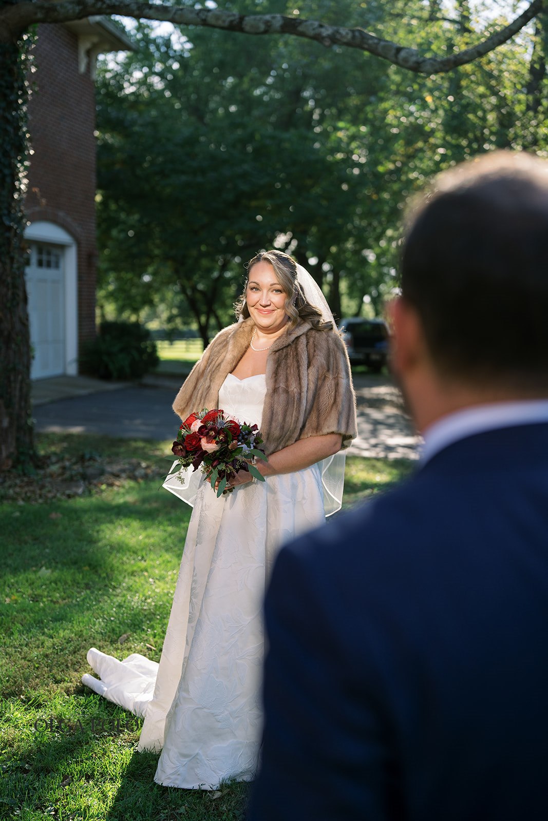 Beth walking toward Ryan for their first-look moment on the wedding day