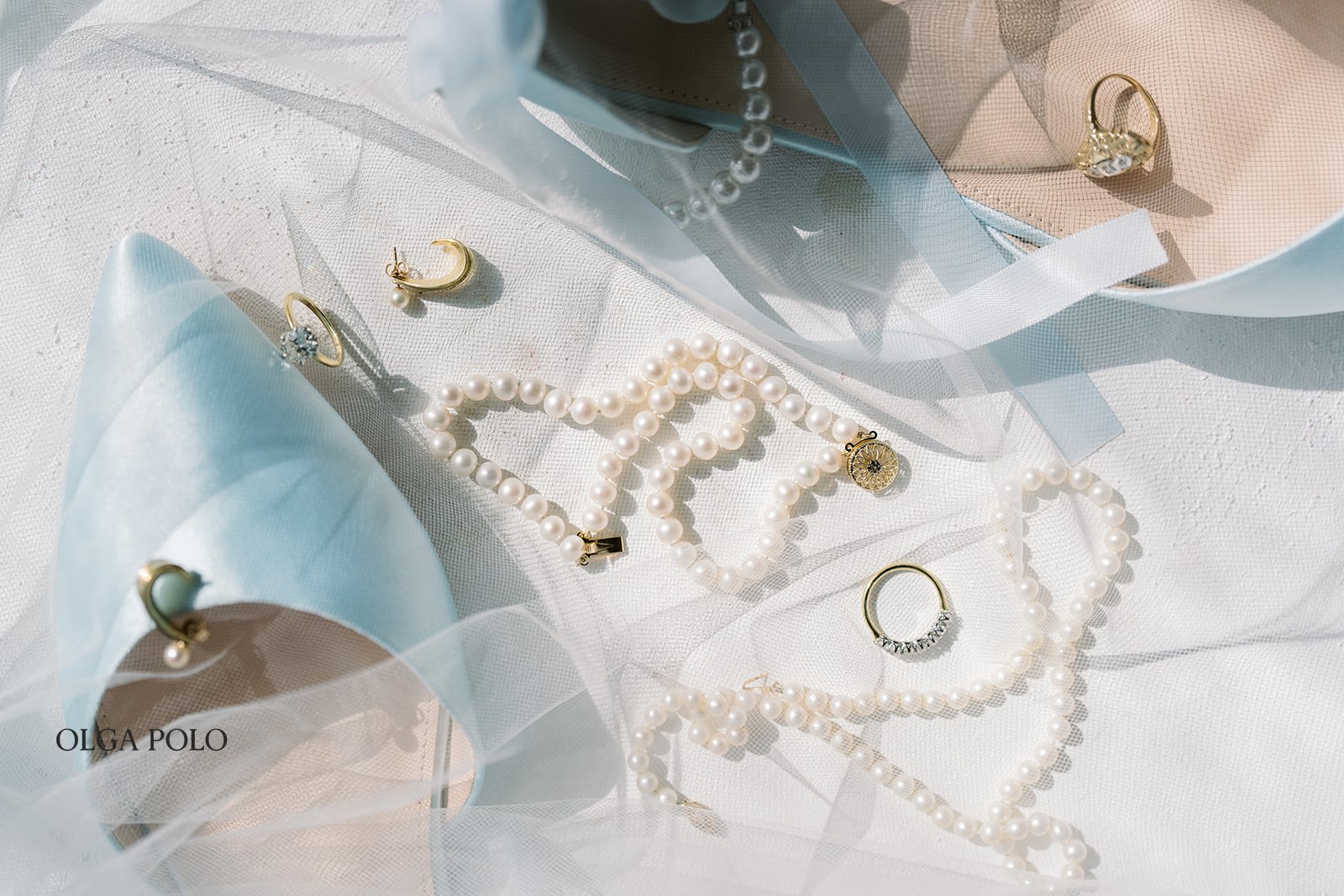 Close-up of Beth's wedding jewelry and bridal details before the ceremony