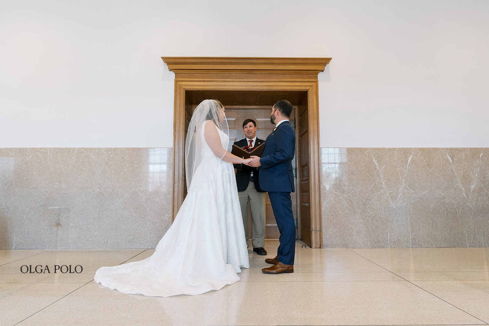 Ryan and Beth standing together during their intimate civil ceremony in Versailles