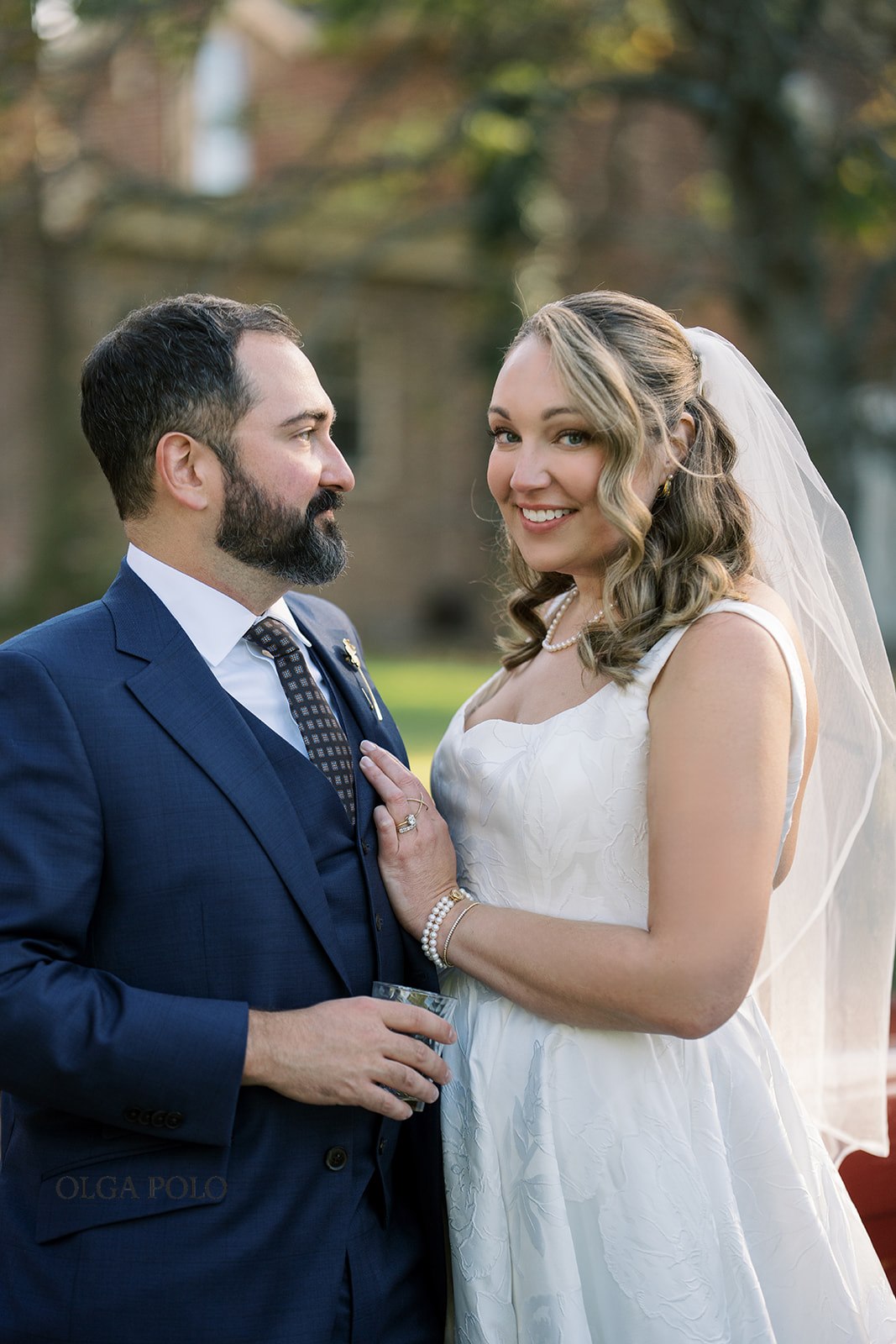 Ryan and Beth standing together for a wedding-day portrait in Versailles