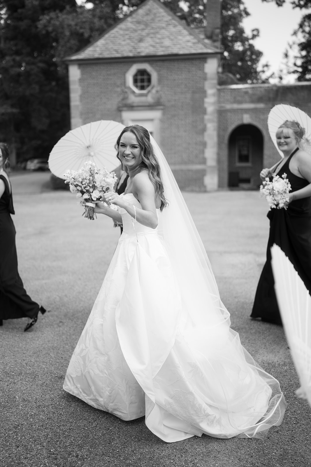 Black-and-white portrait of Olivia in her wedding gown, gallery view 2