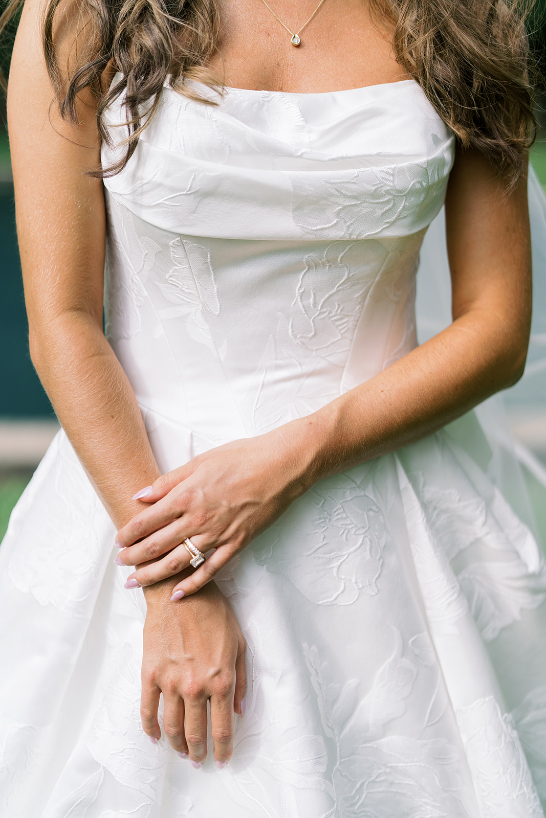 Olivia in an elegant portrait showing her wedding gown