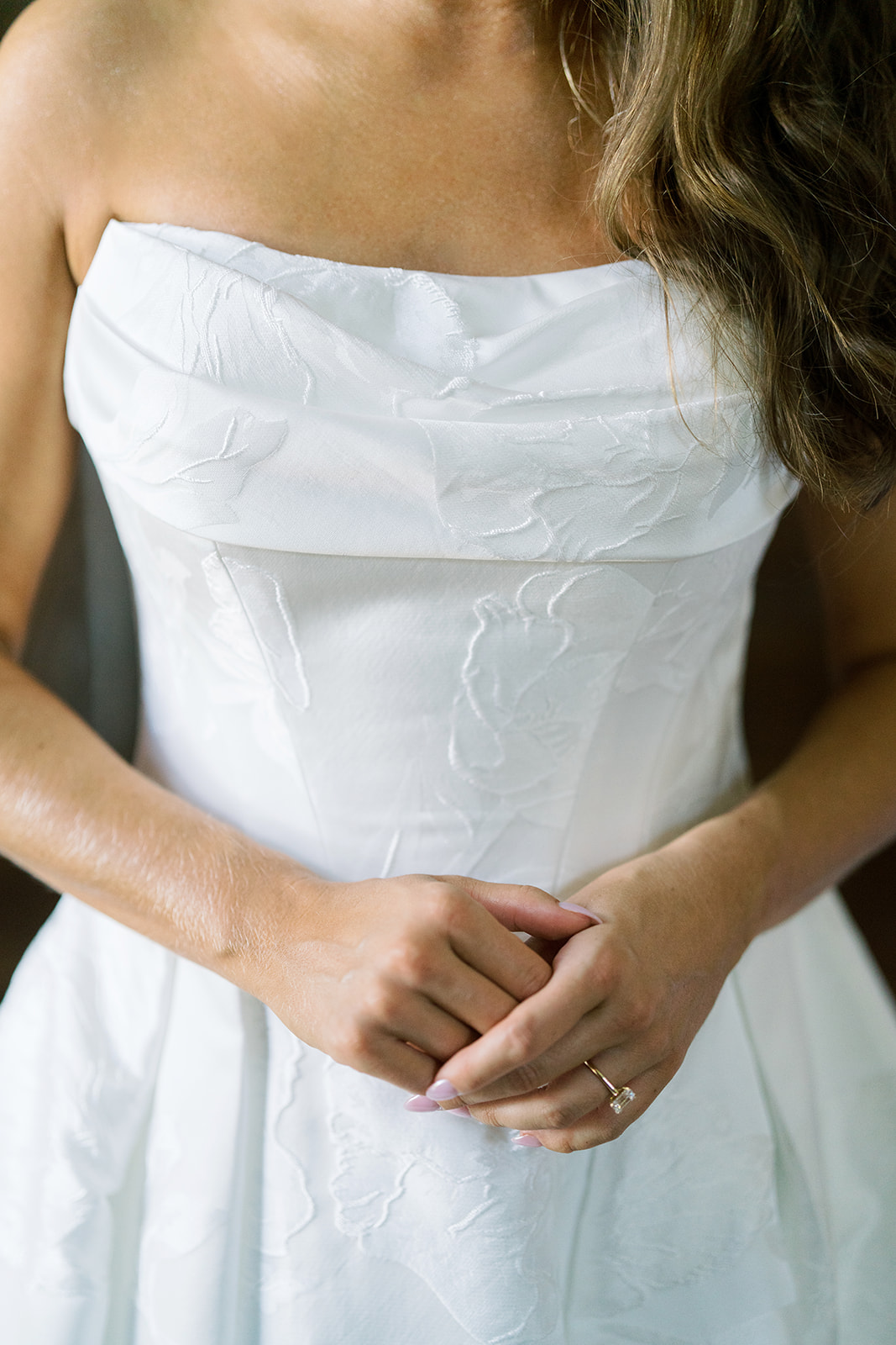 Olivia in an elegant portrait showing her wedding gown, gallery view 4
