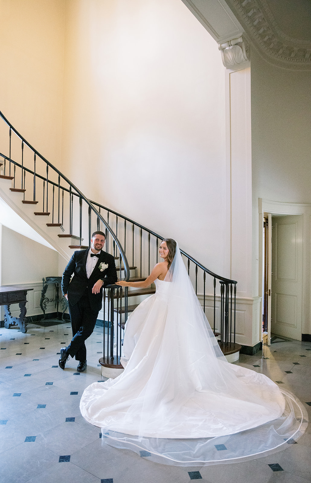Olivia in a bridal portrait on a staircase