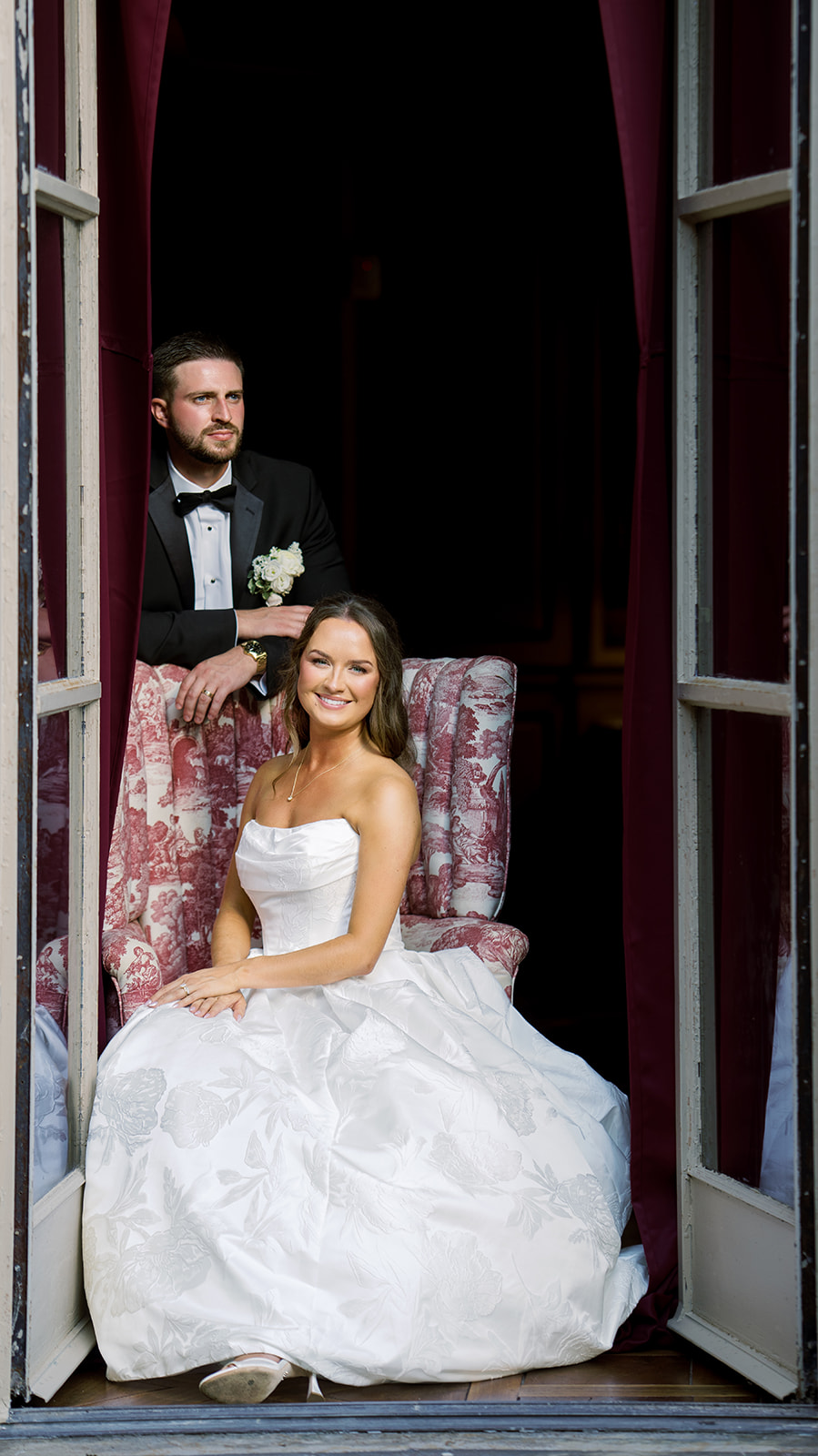 Olivia in a bridal portrait by a window