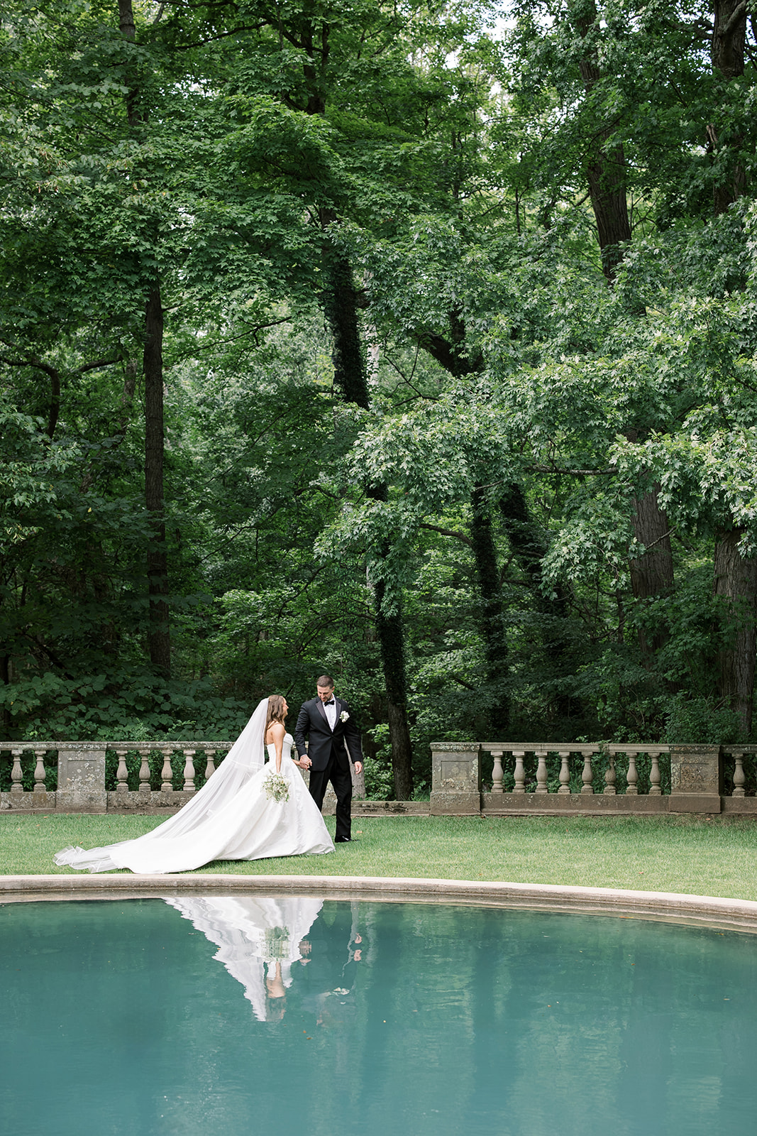 Olivia in an outdoor bridal portrait among trees and greenery, gallery view 2